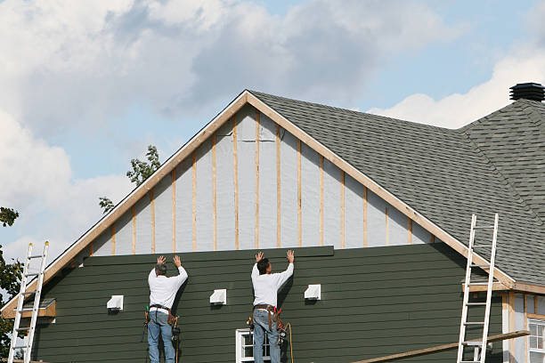Professional Emergency Siding Repair technician working in Shelby, OH